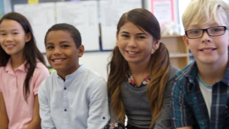 panning shot of 5th grade kids and teacher in classroom