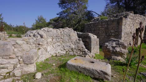 Close-up-view-of-the-crumbled-stone-walls-of-Pyrgos-tis-Rigenas,-Rigena-Tower-byzantine-monastery-in-Akamas,-Cyprus