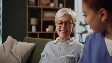 elderly woman with caregiver at home