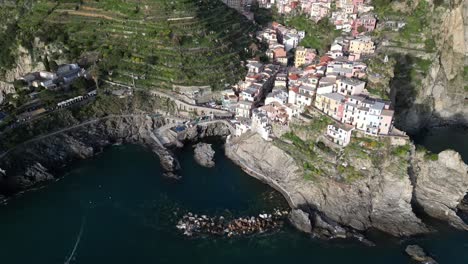 Manarola-Cinque-Terre-Italy-aerial-tightly-pack-village-along-the-cliff