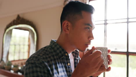 thinking man drinking coffee in peace in home