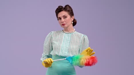 elegant retro woman cleaning with a duster