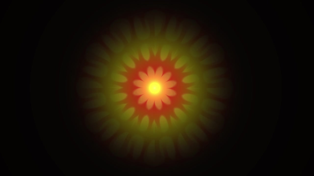 Abstract Glowing Mandala Pattern Rotating on Black Background