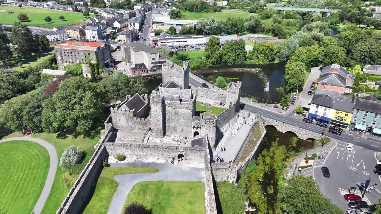Beautiful drone view of Cahir Castle, sunny day in Ireland. Popular tourist attraction. History
