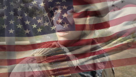 animación de la bandera de los estados unidos sobre un soldado masculino biracial con un arma