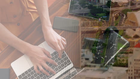 animación de una mujer de negocios caucásica usando una computadora portátil sobre el paisaje urbano