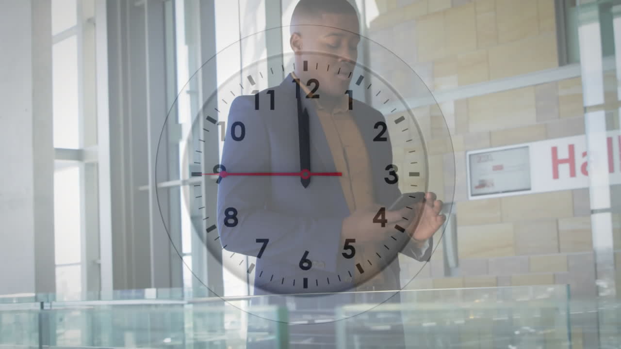Clock animation over business person using smartphone in modern office building