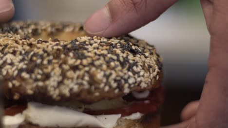 Close-up-shot-picking-up-bagel