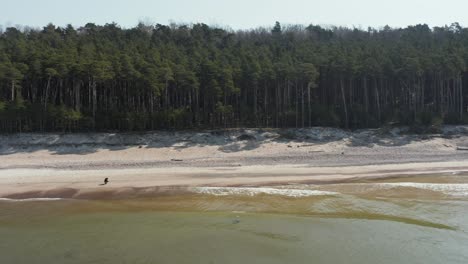 AERIAL:-People-Enjoying-Sunny-Day-Near-The-Dutchman's-Cap-in-Klaipeda