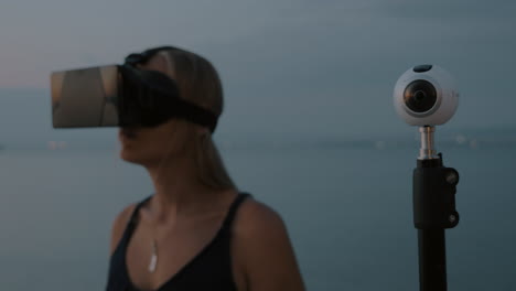 360 degree camera and woman with vr glasses