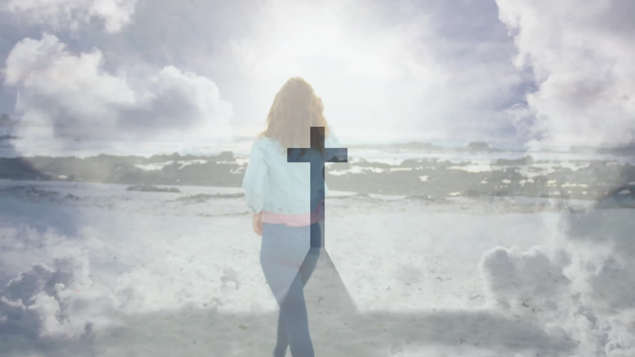 Walking on beach, woman with cross overlay and bright light in animation