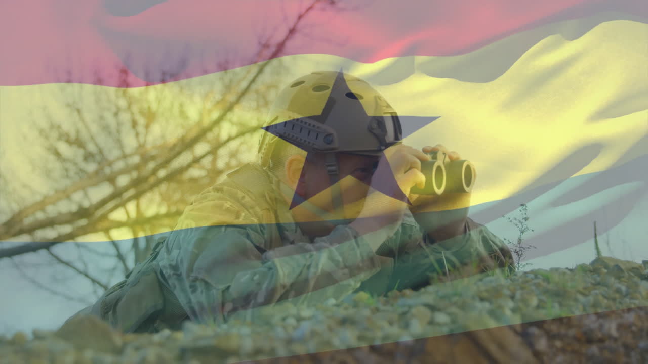 Using binoculars, person in helmet with Ghana flag animation overlay