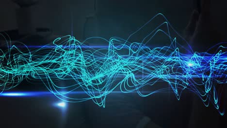 Animation-of-blue-light-spot-and-digital-waves-against-black-background