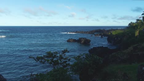 wave-crashing-against-the-volcanic-coastline-off-of-Waianapanapa-State-Park