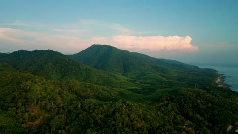 4k cinematic nature drone footage of a panoramic aerial view of the beautiful beaches and mountains on the island of koh lanta in krabi, south thailand, during sunset