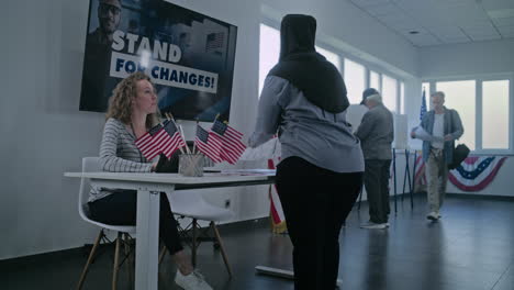 people voting in a polling place