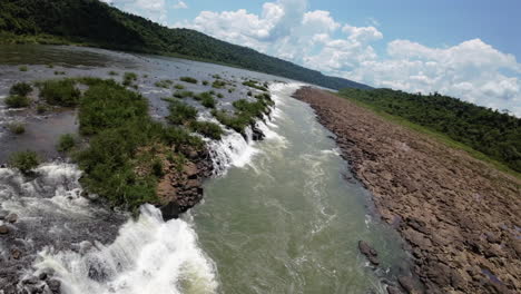 drone fpv view of mocona waterfalls along uruguay river, adventure and exploration
