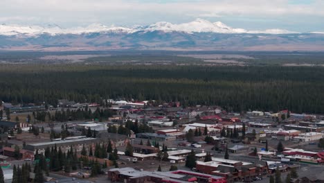 Establishing-drone-shot-panning-over-West-Yellowstone-in-the-late-Fall