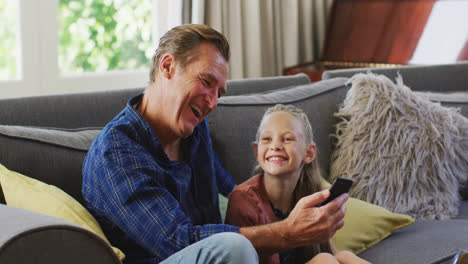 Grandfather-and-granddaughter-spending-time-together-