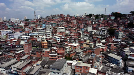 Aerial-view-around-slum-homes-in-a-needy-district-of-Sao-Paulo,-daytime-in-Brazil