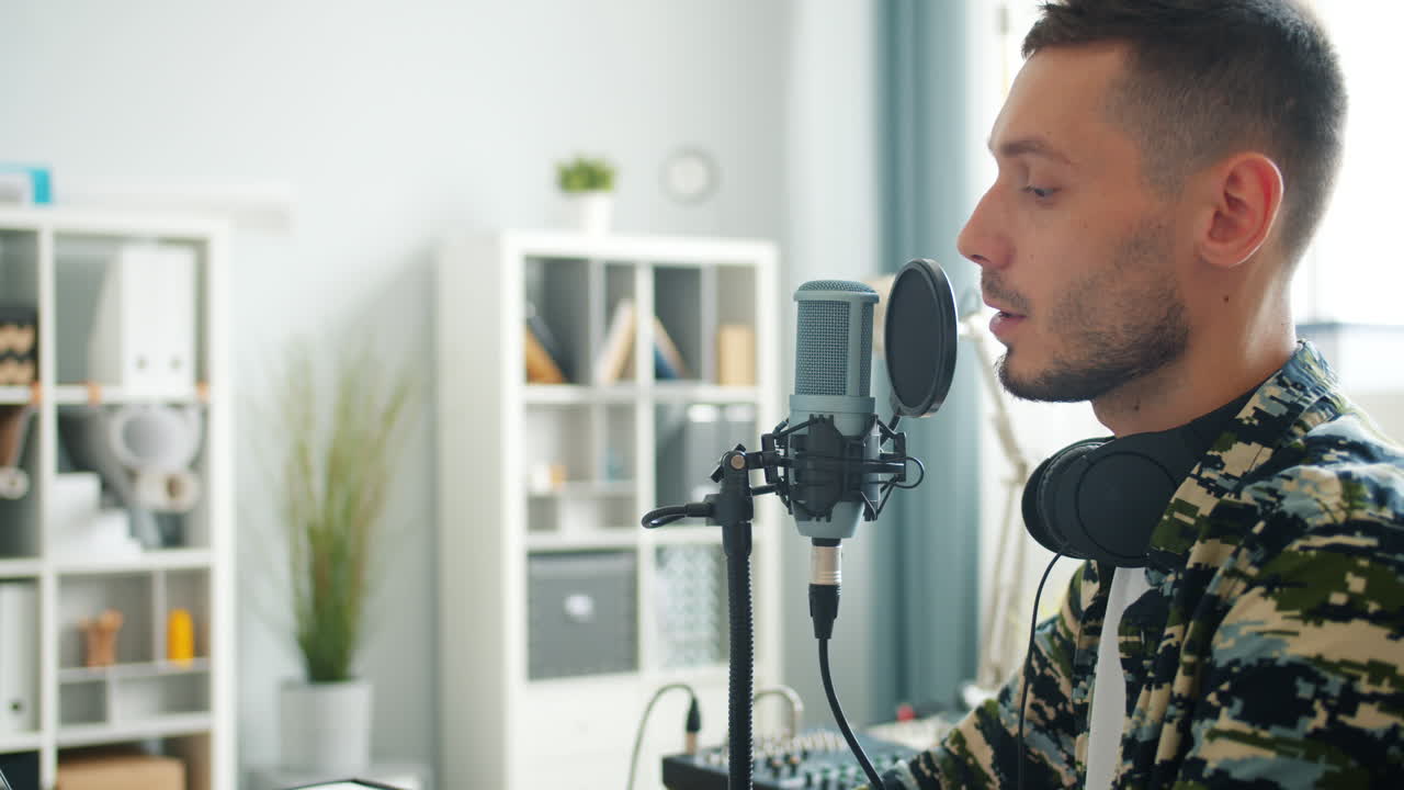 Man Recording Podcast in Home Studio