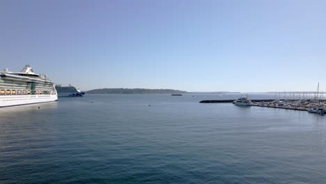 Aerial-view-of-beautiful-large-white-cruise-ships-docked-in-Seattle,-WA-USA