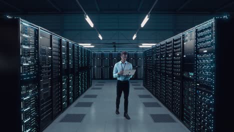 futuristic animated concept: big data center chief technology officer using laptop standing in warehouse, activates servers, information digitalization starts. saas, cloud computing, web service