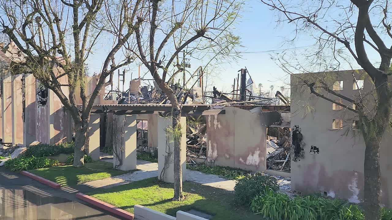 Palisades Wildfire Aftermath, California USA, Remains of House Destroyed by Wildfire. Walls and Scrap