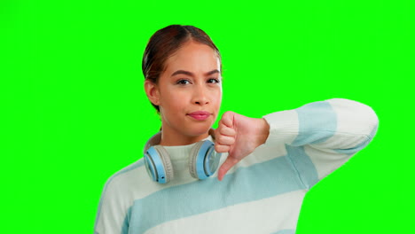 Thumbs-down,-green-screen-and-face-of-a-gen-z-girl