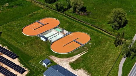 wastewater treatment plant water purification facility chemical process, aerial drone view