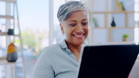 Senior-woman,-tablet-and-smile-in-home-living