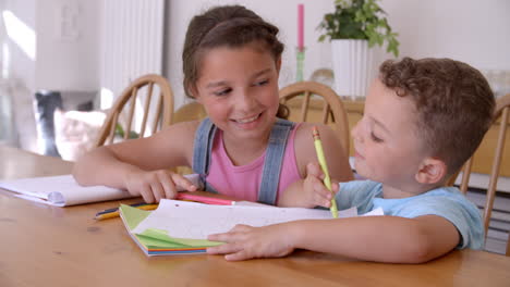 Brother-And-Sister-Coloring-Picture-At-Table