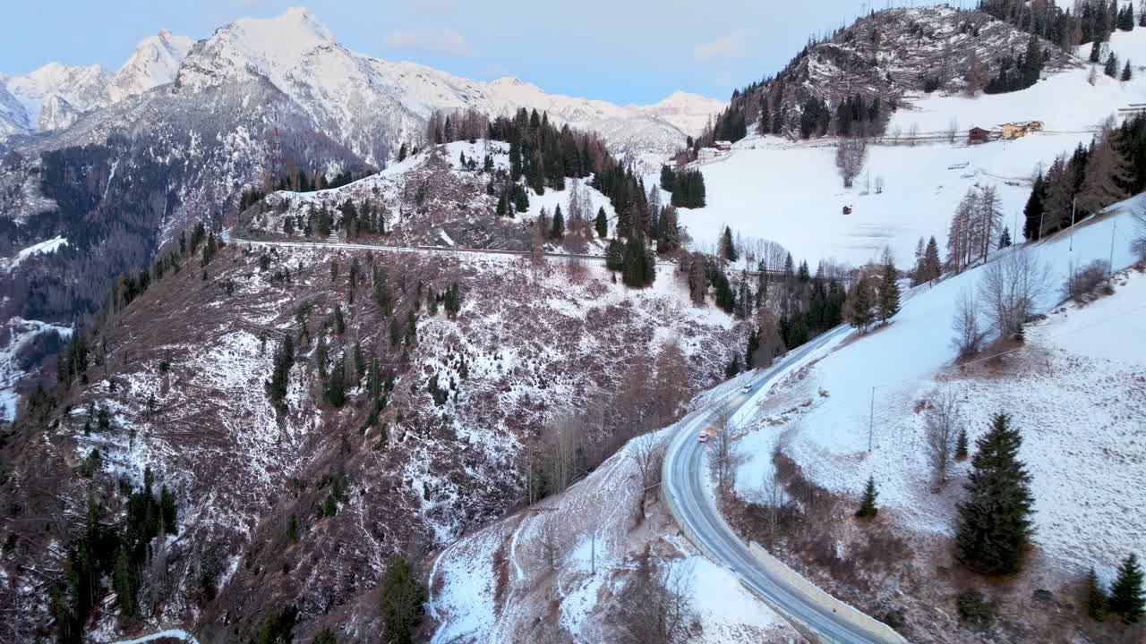 Aerial drone view of snow on the mountains in the Dolomites, Italy