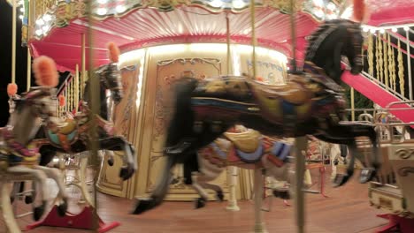 looped full circle of the vintage carousel carnival fair merry go round close up