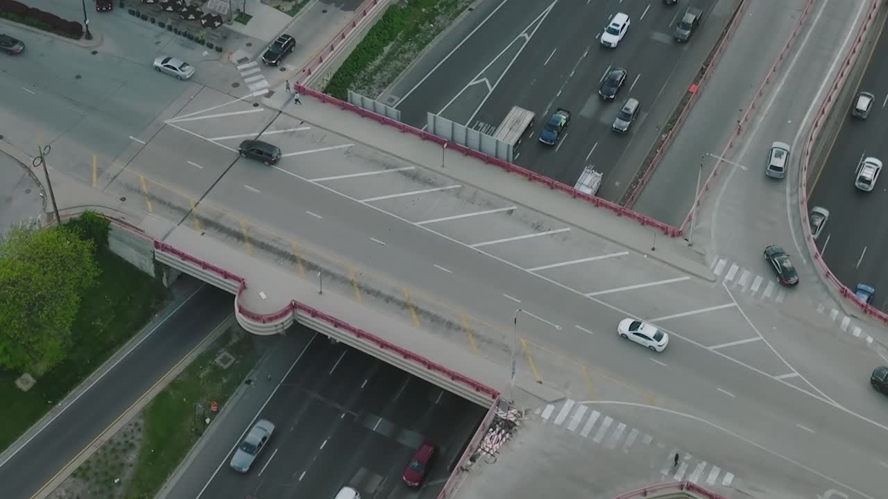 Traffic flows along highways in Chicago during daytime hours