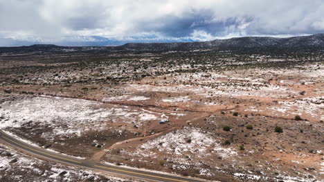 motorhomes parked over semi-arid terrain near utah, united states