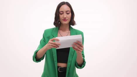 woman opening an envelope or letter
