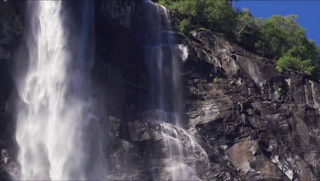 the sven sisters waterfall - an iconic feature of the geiranger fjord, norway