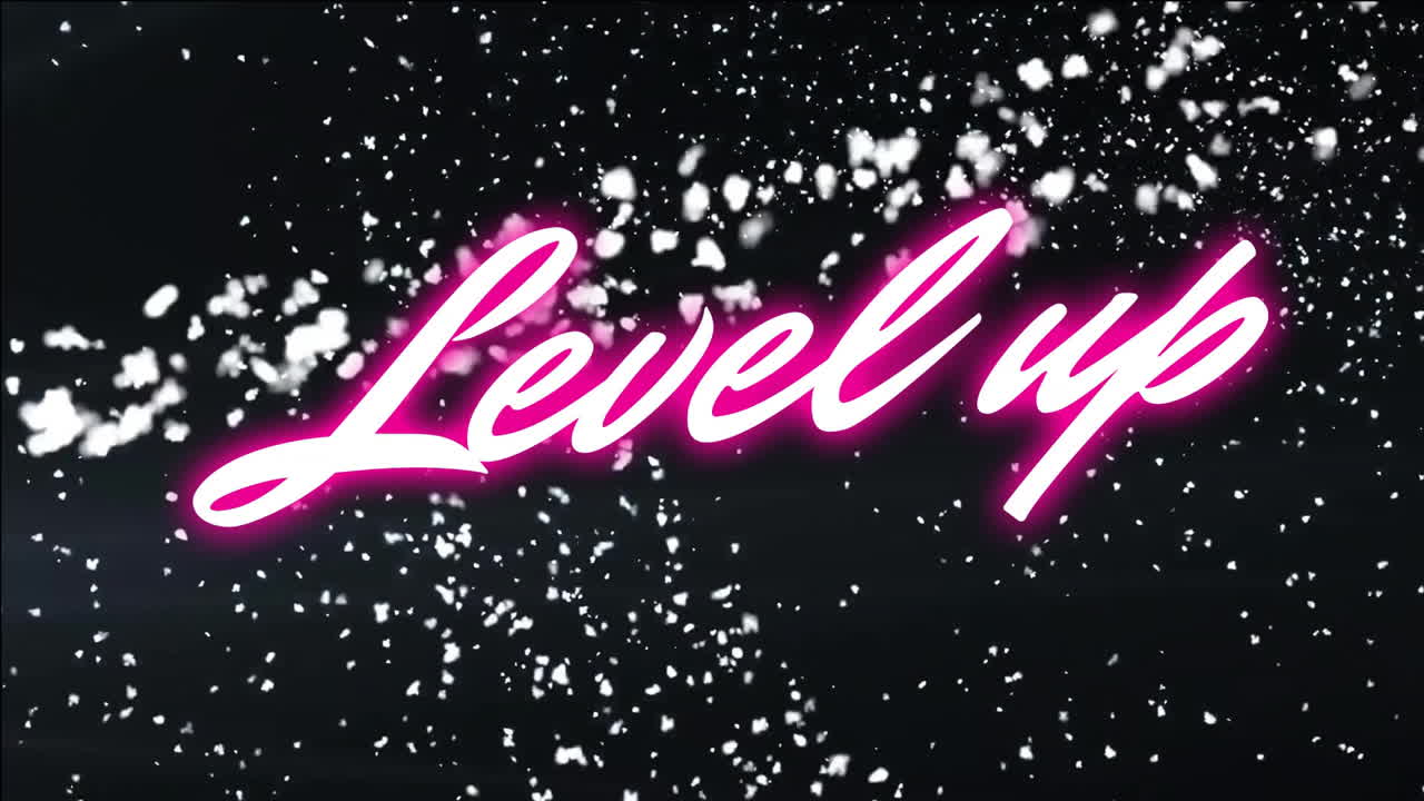 Level up text animation over sparkling light effects on dark background