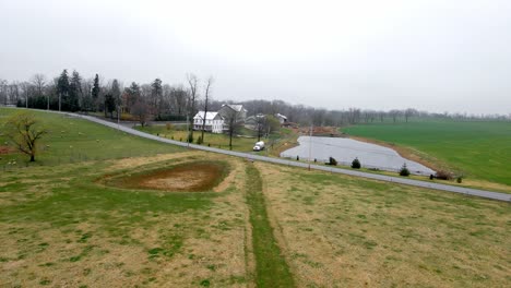 A-truck-coming-to-pick-up-a-delivery-of-milk-from-a-farm-in-Pennsylvania-on-a-gloomy-morning