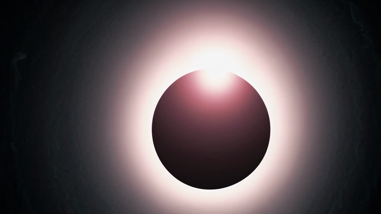 A top-down video view of a glowing eclipse, showcasing a dark circle surrounded by a luminous halo