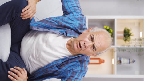 Vertical-video-of-Elderly-man-looking-at-camera-in-amazement.