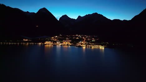 pertisau village at night with stunning views of surrounding mountains and lake achensee in tyrol, austria