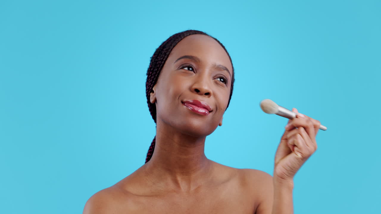 Beauty, makeup and brush with face of black woman