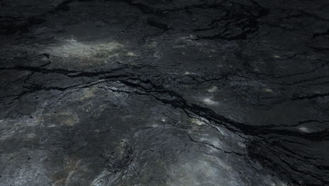 dark cracked rock surface