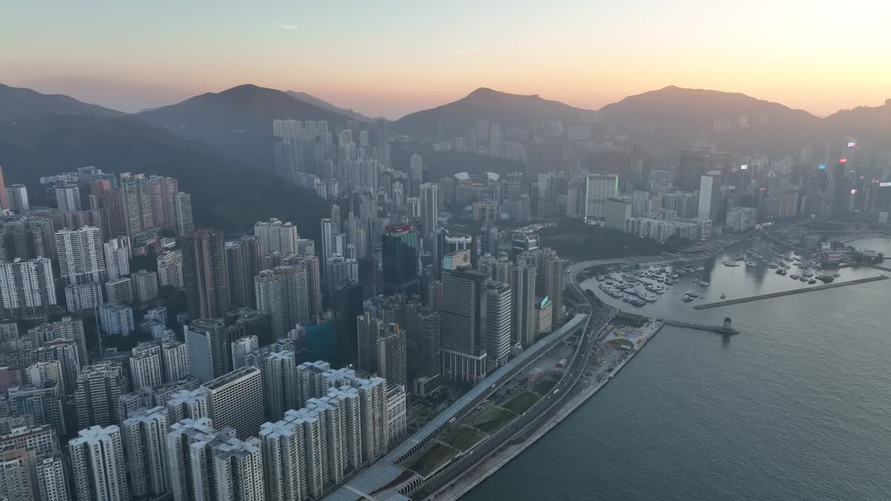 imágenes aéreas en 4k de la ciudad de hong kong al atardecer