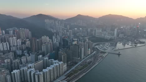 4k aerial view footage of hong kong city in sunset