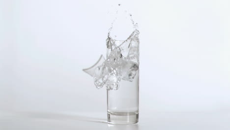 Cube-falling-in-super-slow-motion-breaking-the-glass