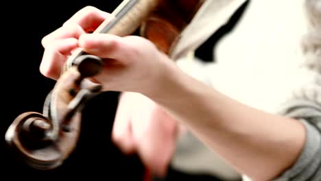 violinist playing - closeup of her hands