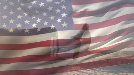 someone chilling at the beach with us flag waving foreground